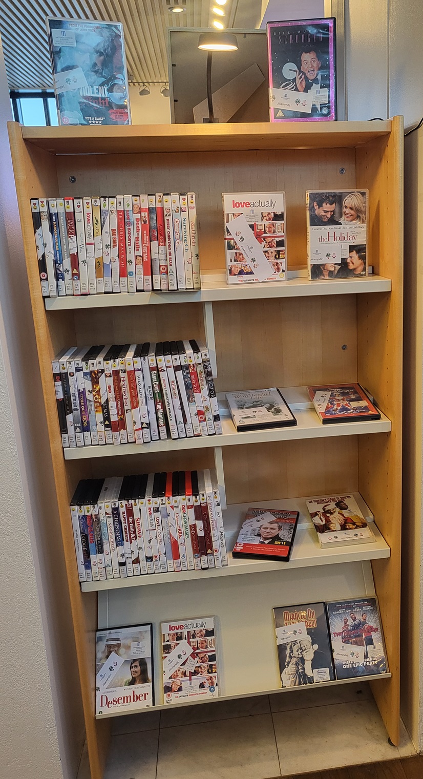 Shelves with Christmas movies on DVD